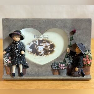 Forever Young. Heart-Shaped Kim Anderson Photo Frame with Figurines.